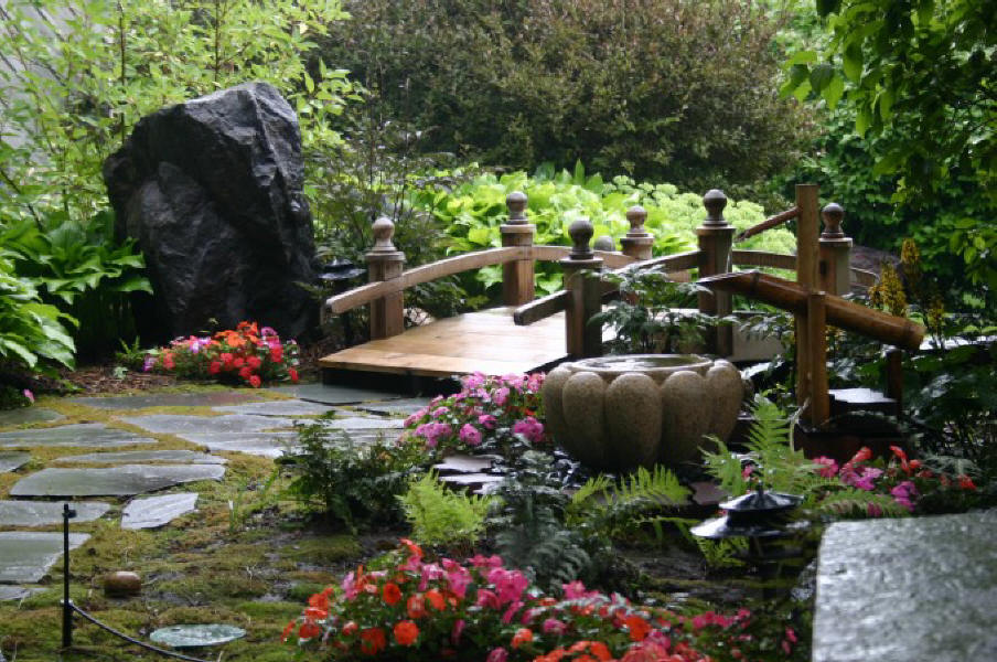 japanese-garden-bridge-design-with-big-stone-black-color