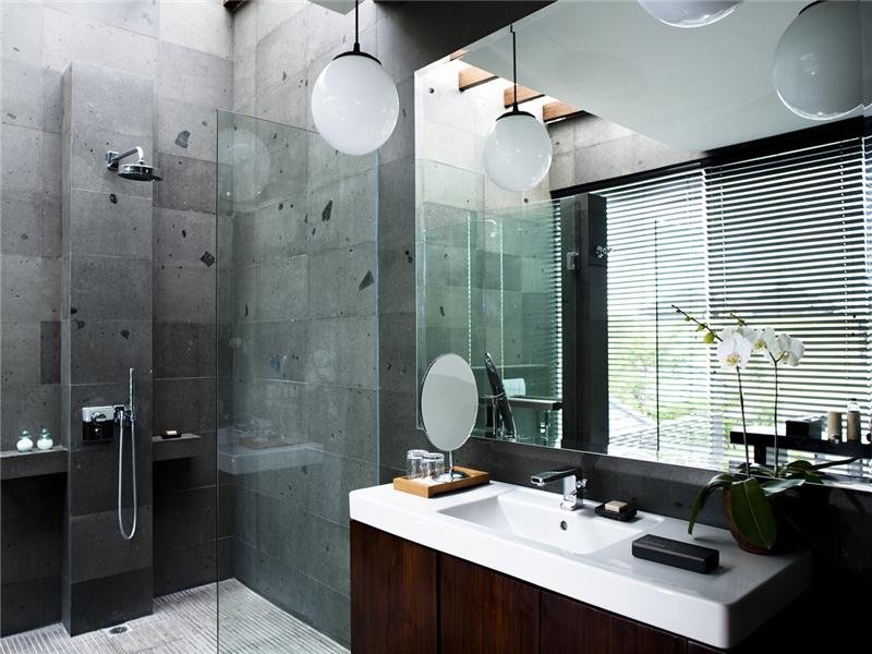 white-hanging-light-fixture-above-vanity-paired-with-cubical-shower-for-appealing-bathroom-design