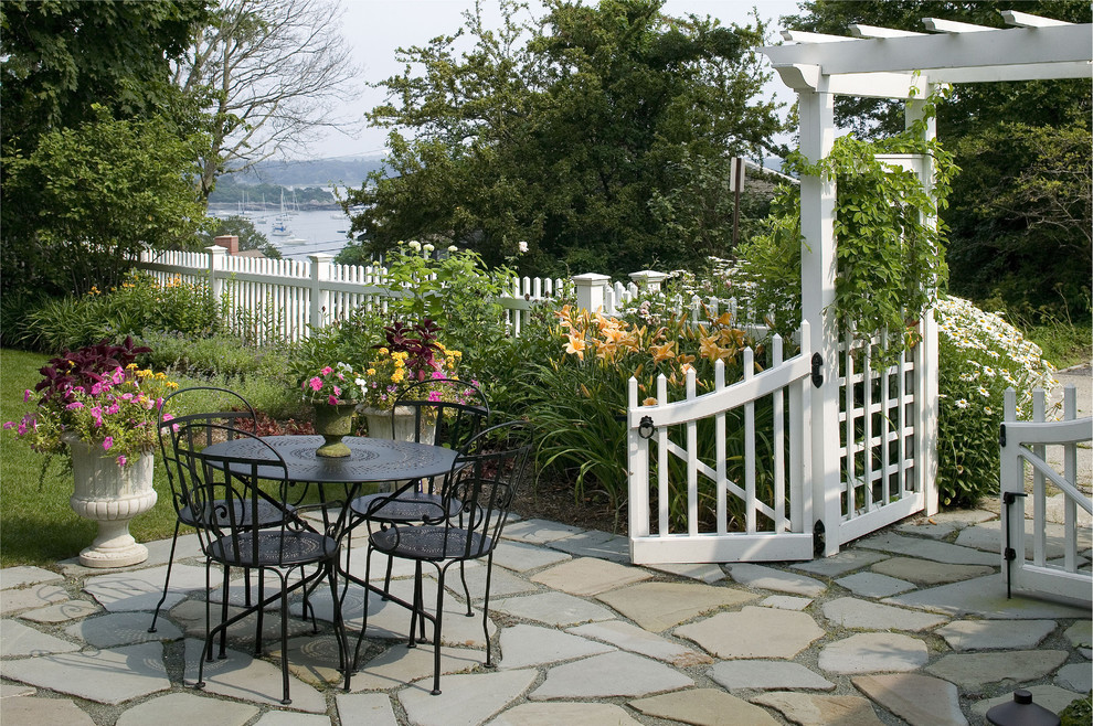 Glamorous-Dog-Fences-convention-Boston-Beach-Style-Patio-Decorators-with-arbor-black-metal-dining-set-bluestone-terrace-fence-and-gate-flagstone-flowering-plants-metal