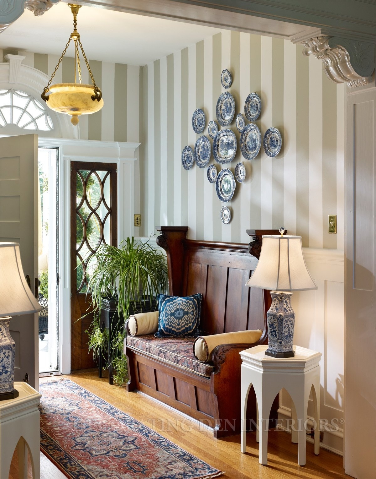 foyer_small-entryway-with-wood-flooring-area-rug-and-blue-china-accents