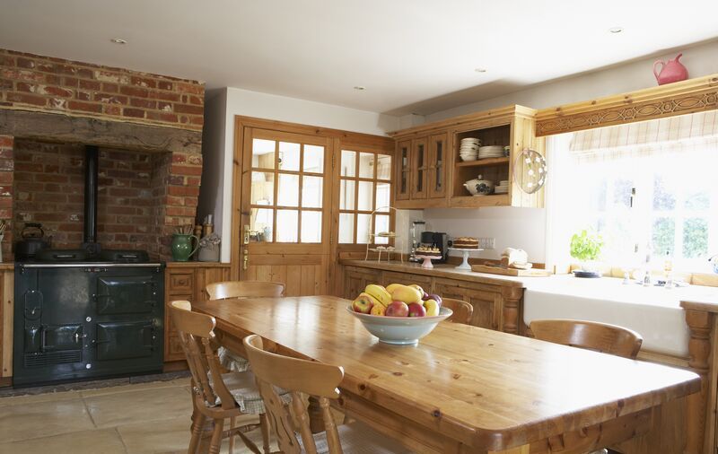 kitchen-cabinets-traditional-light-wood-hood-farm-sink