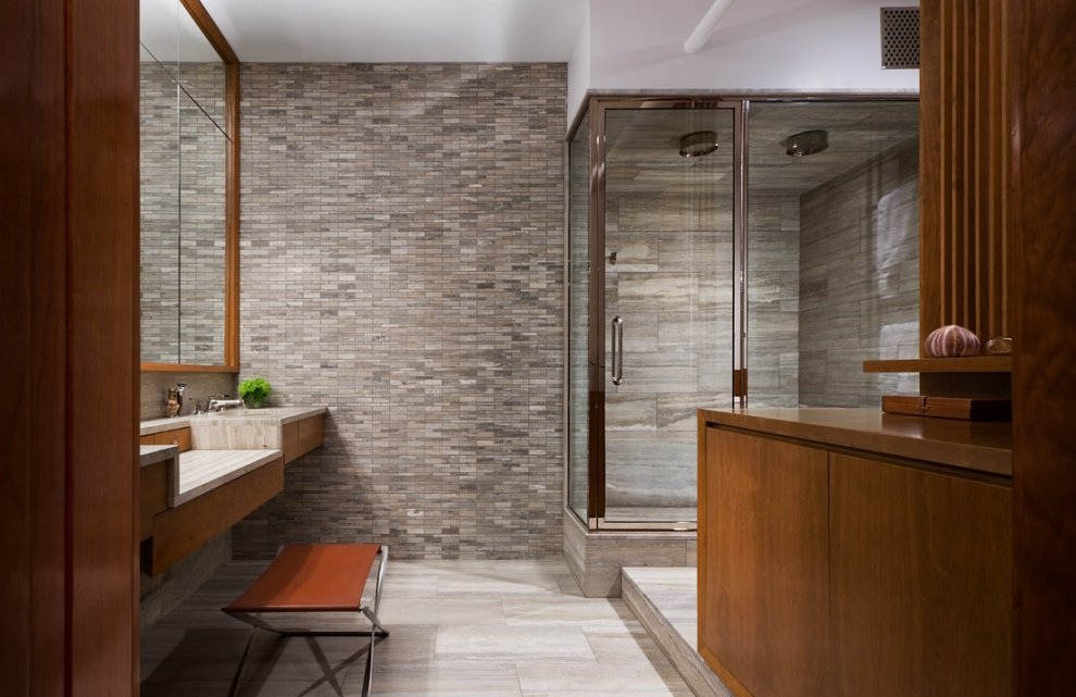 framed-bathroom-with-stone-feature-wall-and-double-shower