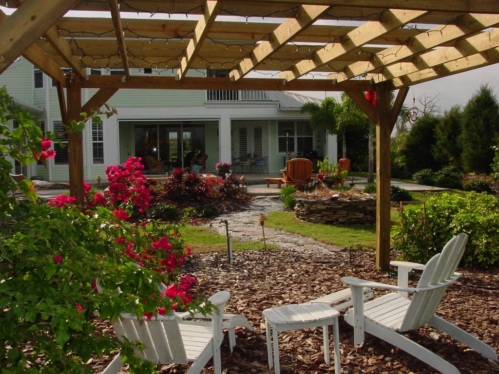 pergola with white chaer