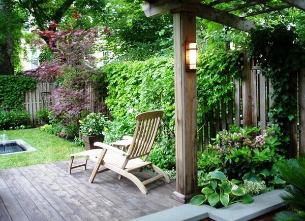 patio-deck-with-grapevine-arbor-lounge-chair-backyard-landscape
