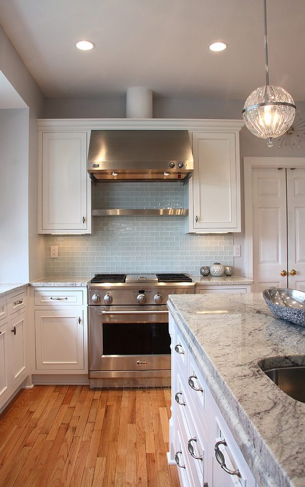 Modern-kitchen-granite-countertop-white-cabinets-stainless-steel-oven-hood