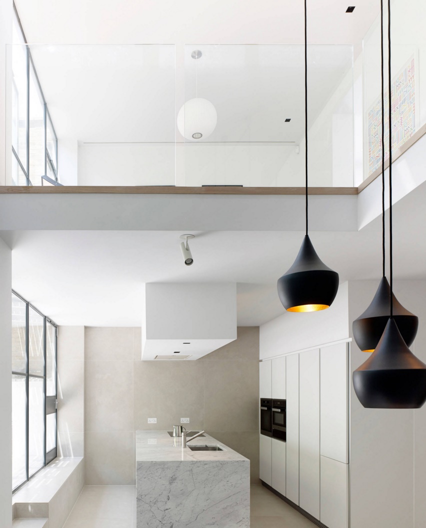 Tom Dixon lighting in a modern kitchen and dining area