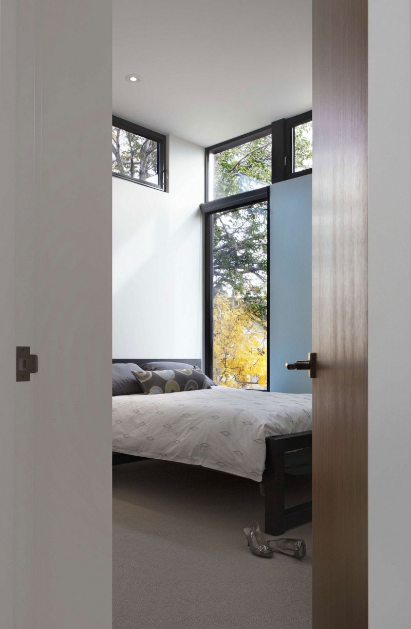 astonishing-bedroom-ideas-with-floor-to-ceiling-window-wooden-bed-frame-and-wooden-door-panel