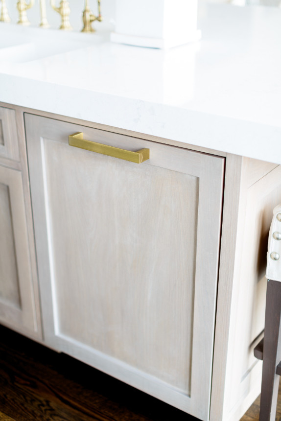 All White Kitchen Cabinet With Golden Accesories