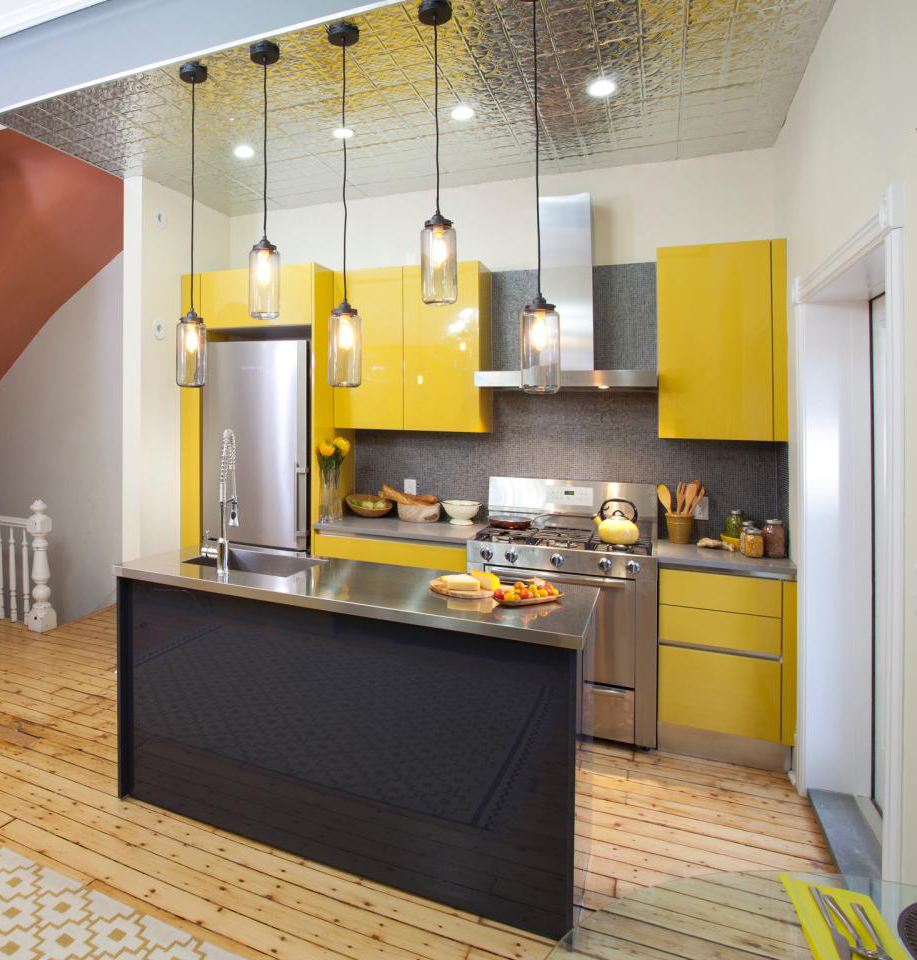 Bright Yellows And Metallic Surface Kitchen