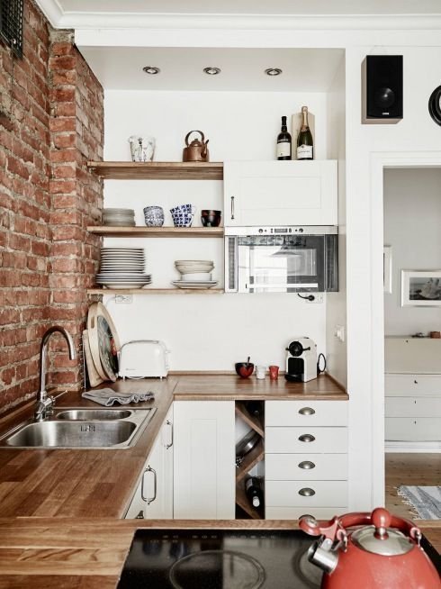 Kitchen With Exposed Brick Walls
