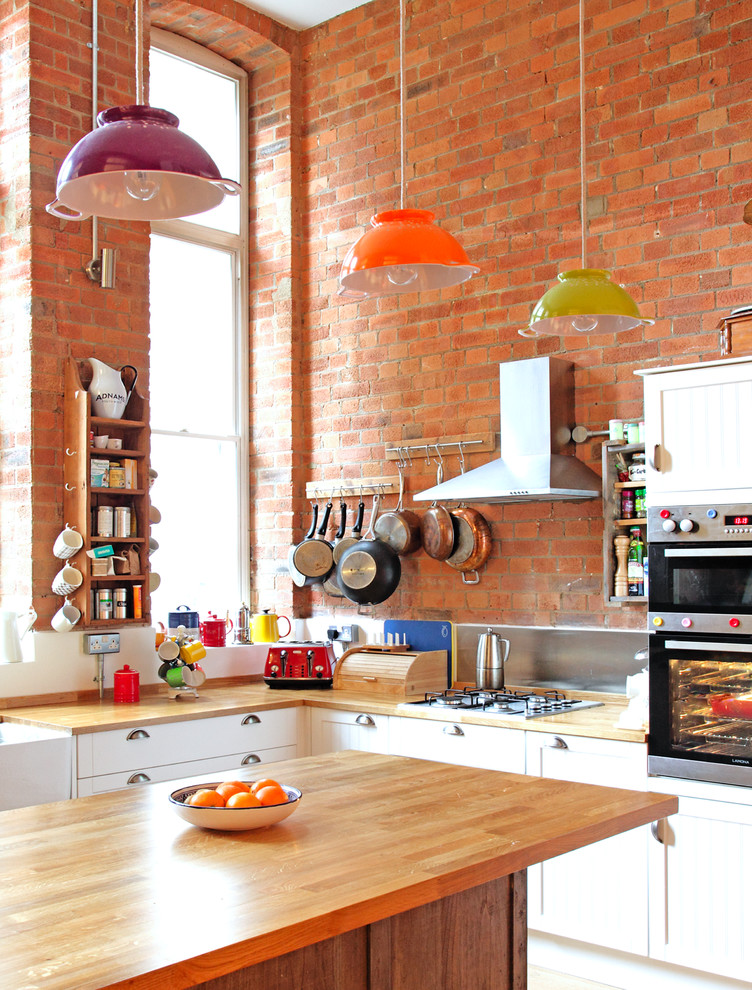 Eclectic Kitchen With Exposed Brick Wall