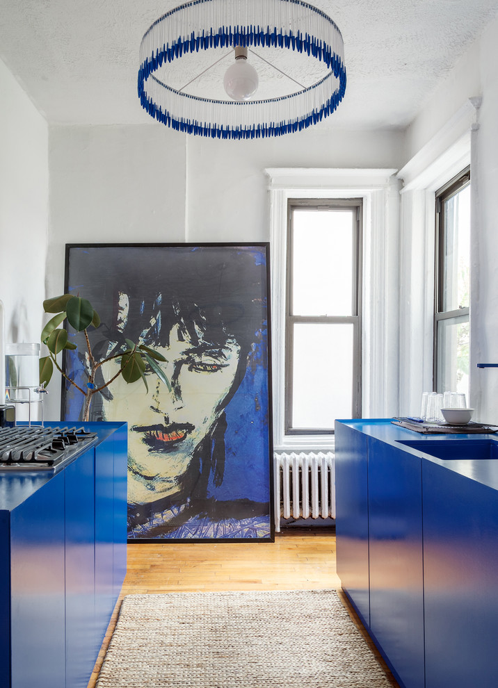 Beautiful Apartment Kitchen With Dark Blue Laminate Cabinets Thewowdecor