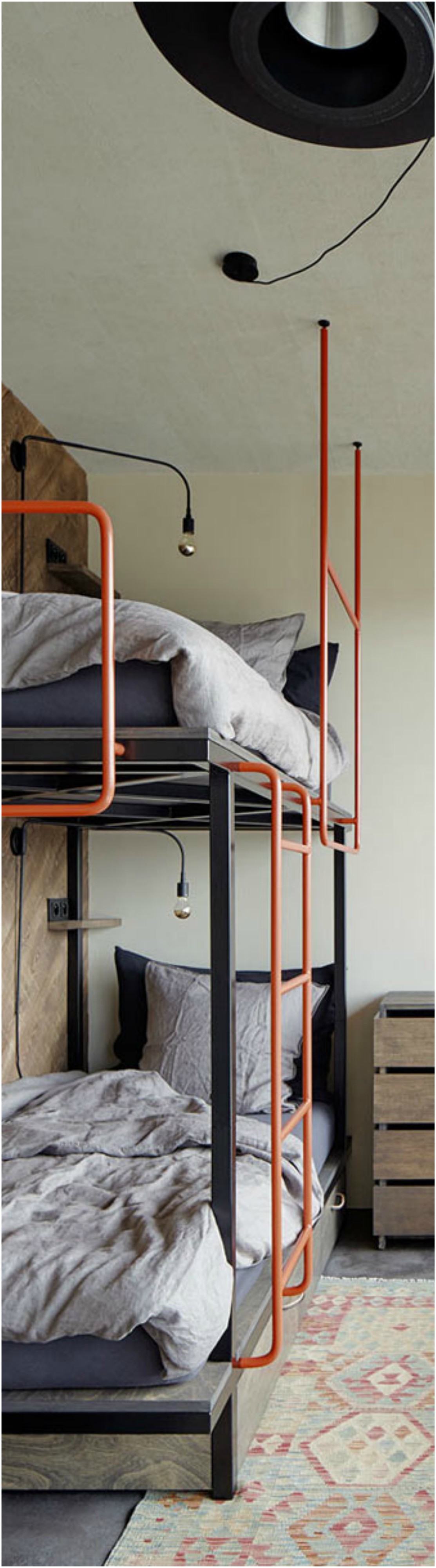 Industrial Style Bunk Bed Finished Off With Orange Metal Components Thewowdecor
