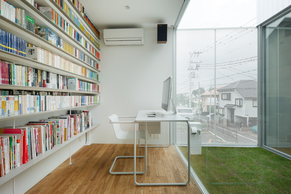 Modern Open Home office With Library Thewowdecor