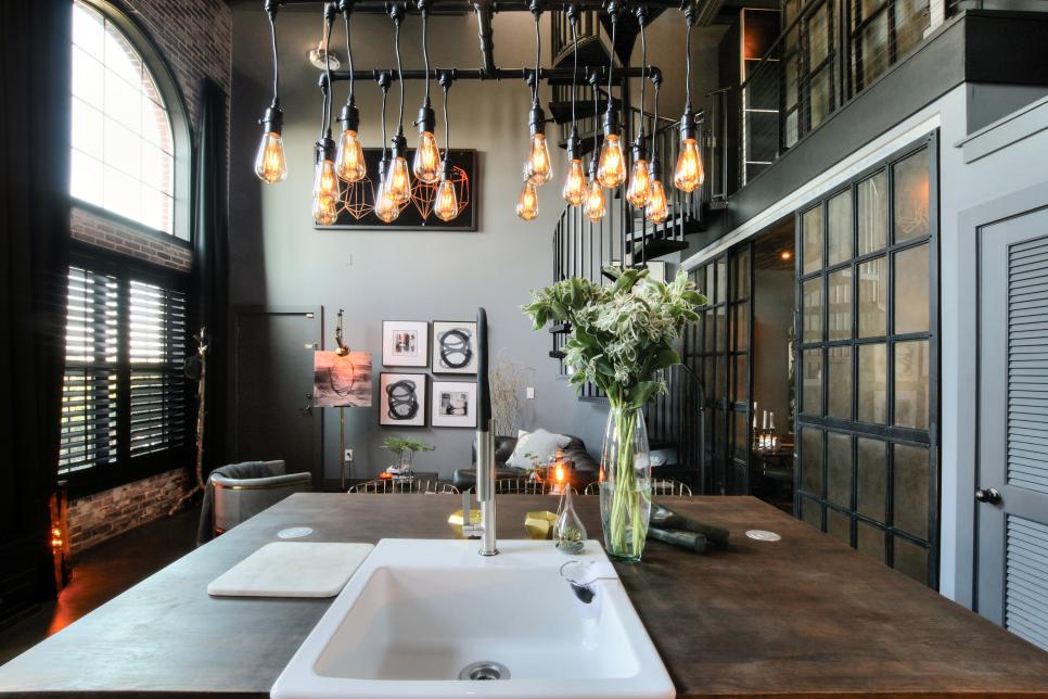 Open Industrial Kitchen With Bulb Pendants